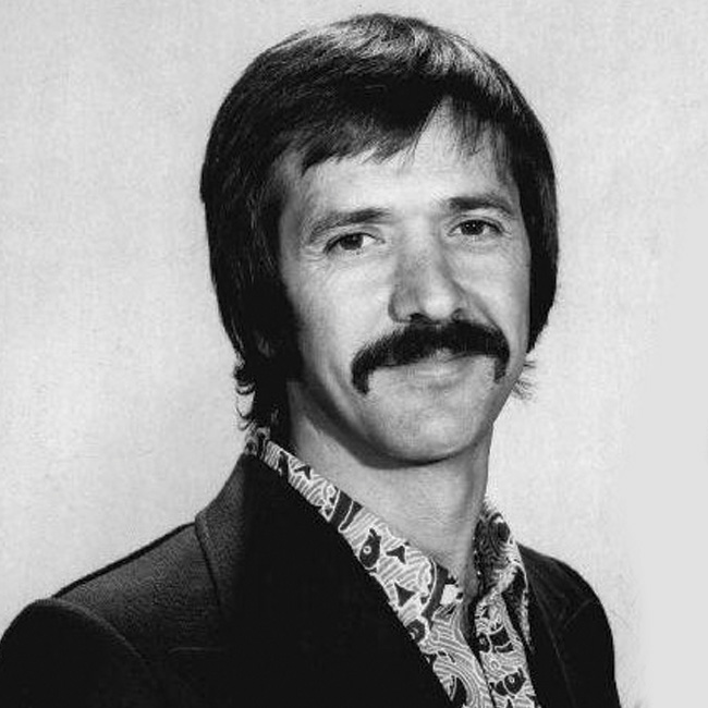 Photograph of Baird & Warner agent Sonny Bono